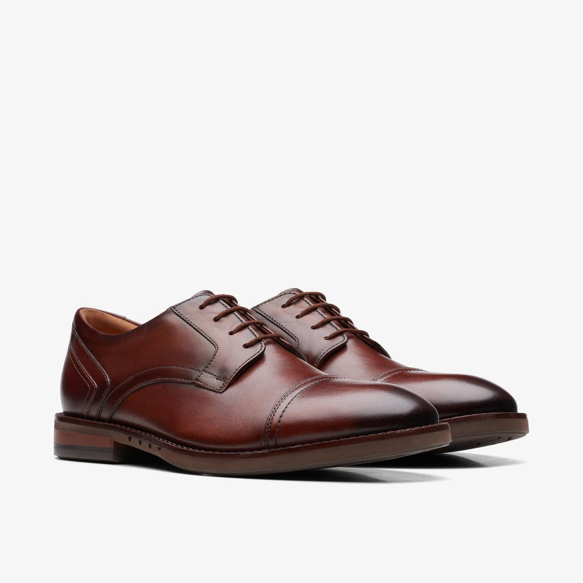 Clarks Un Hugh Cap Men's Mahogany Leather 26172837 — sole view
