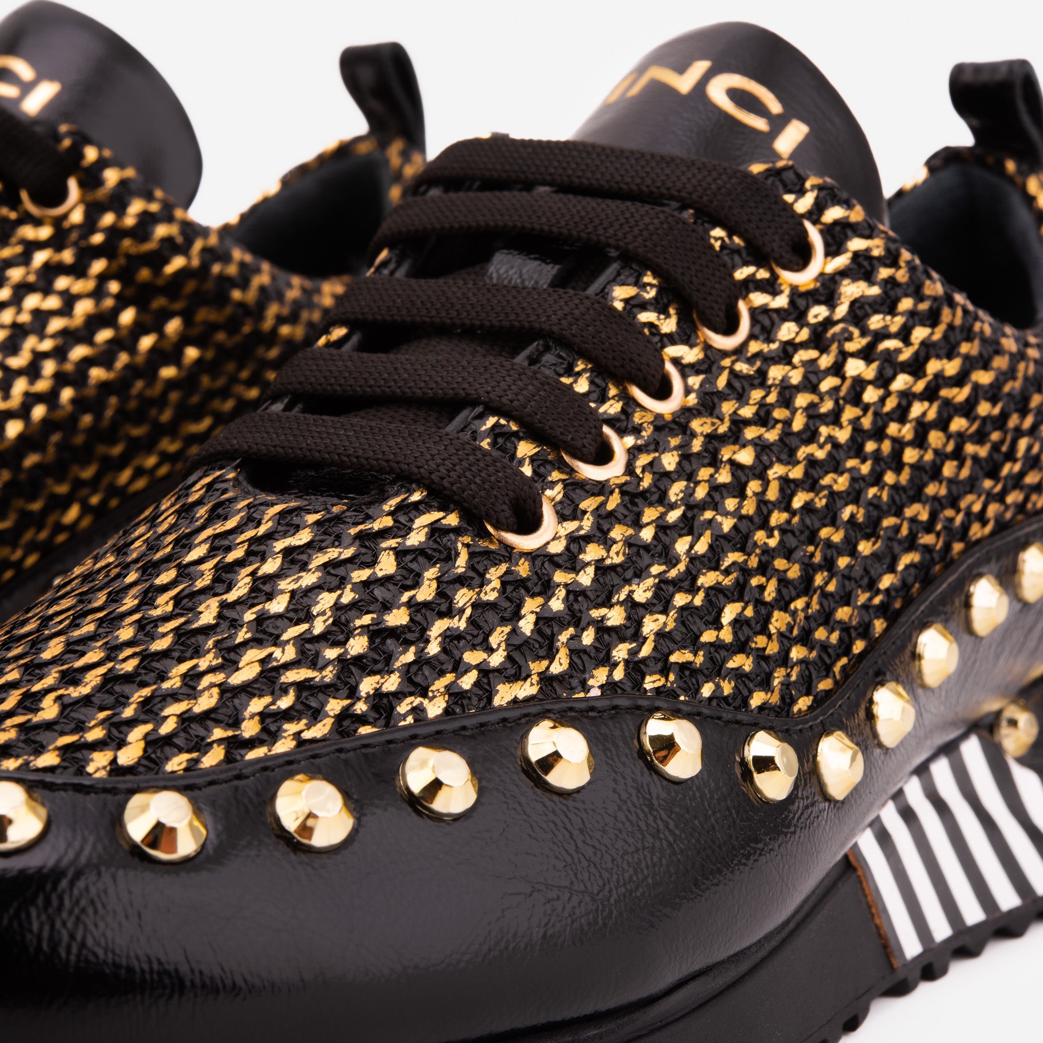 The Aurelia Black Gold Woven Leather Women Sneaker