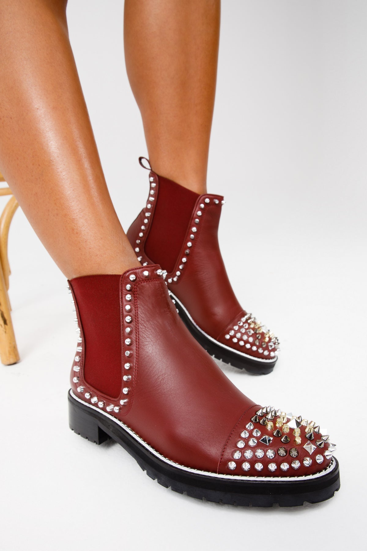 The Vuvulane Burgundy Spike Leather Ankle Women Boot