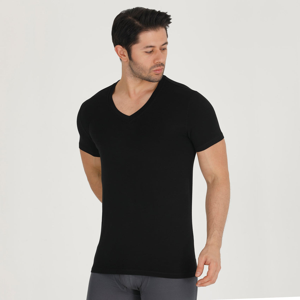 Bambooven V-neck undershirt in Black, on-model front three-quarter view