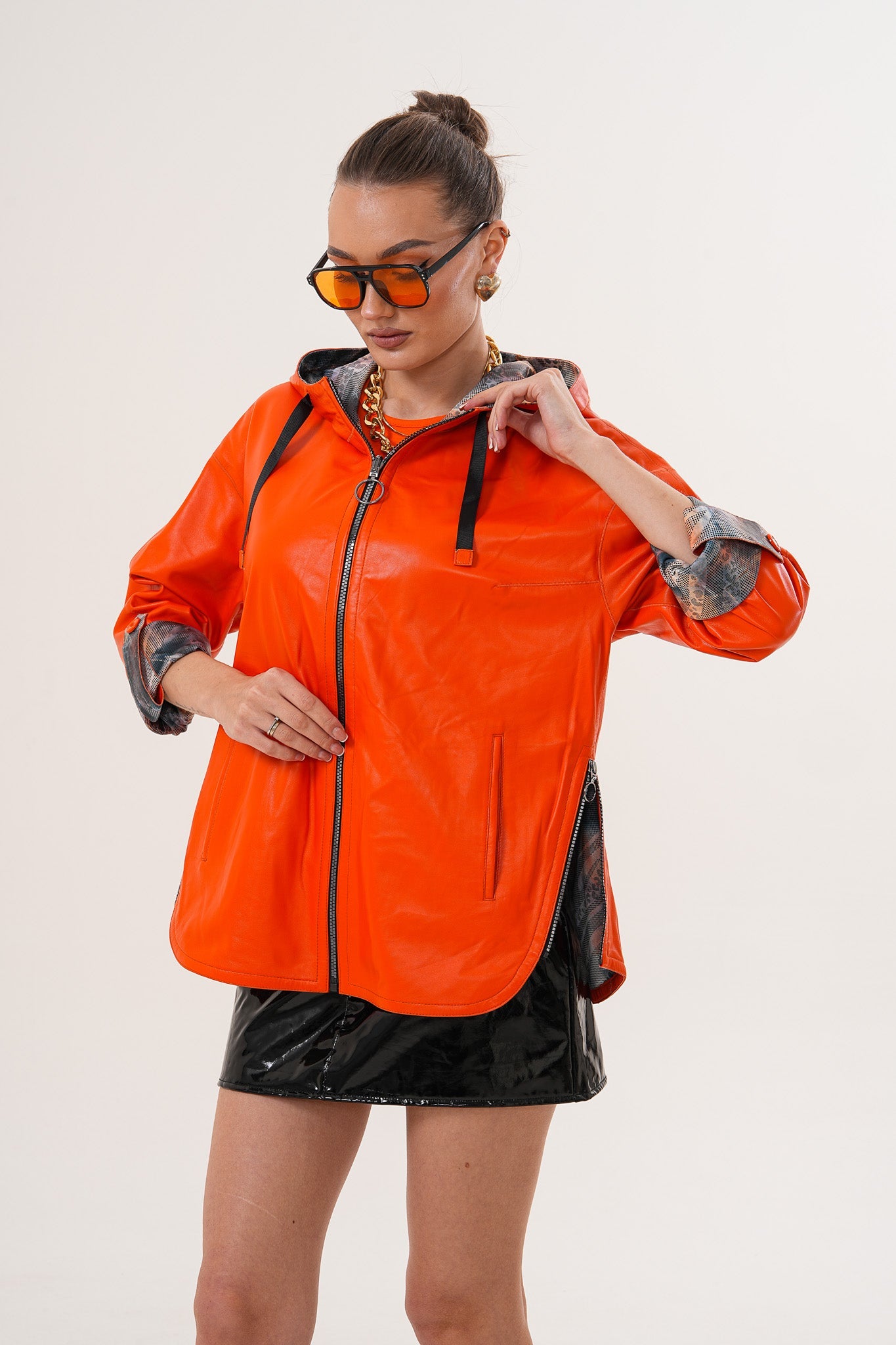 The Nyxara Reversible Hooded Orange Leather Women Jacket