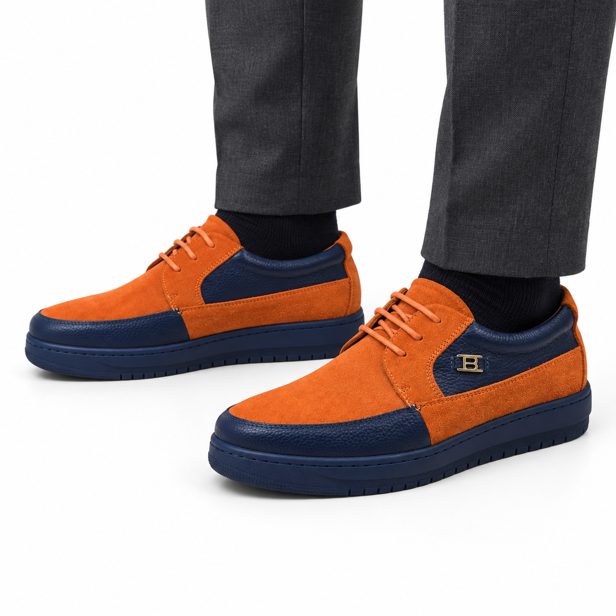 AI-generated styling illustration of British Walkers Westminster 2 men's Knicks Edition orange and navy sneakers on a white background
