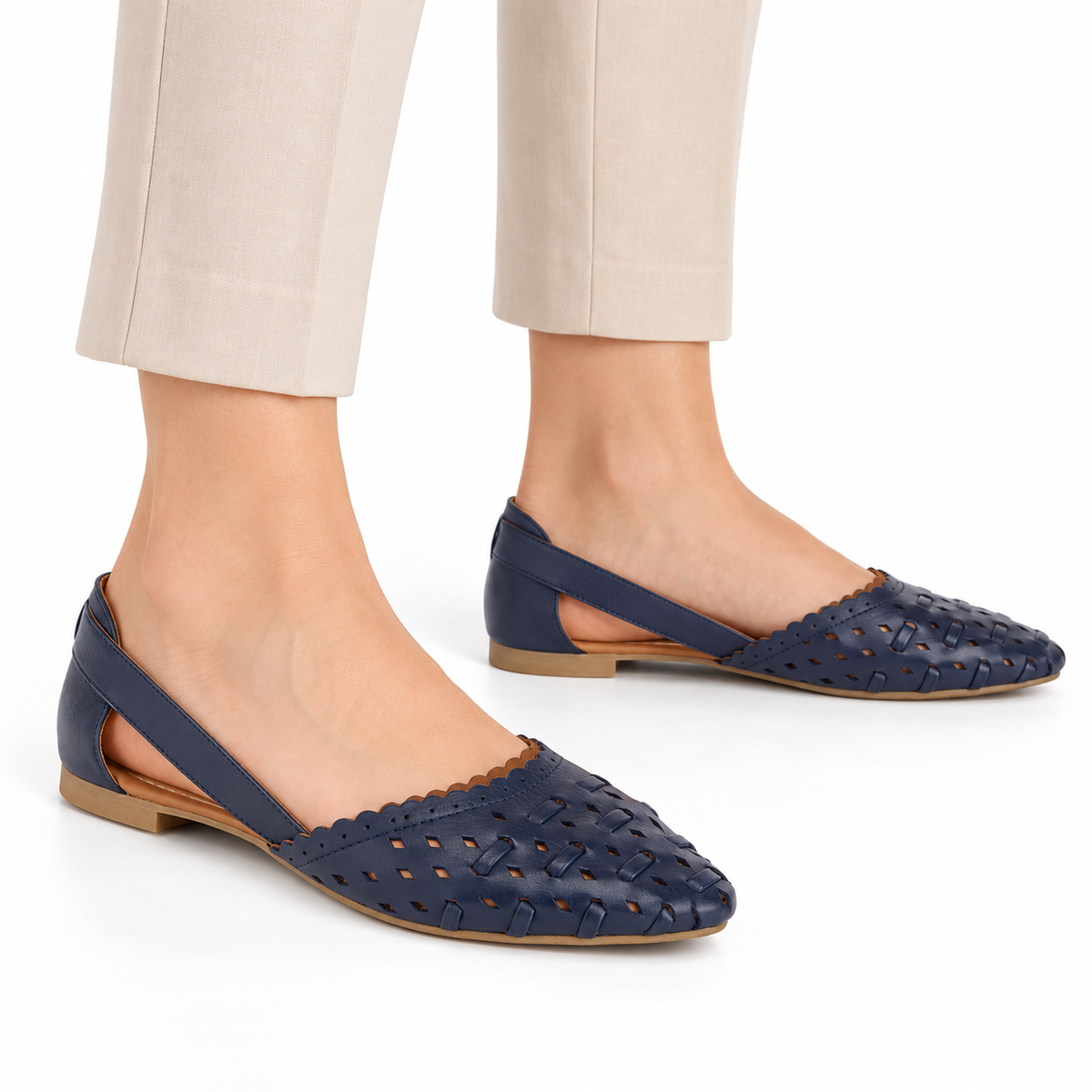 AI-generated styling illustration of an adult model wearing the Spring Step Delorse flats in Navy; original product photo shows actual item details.