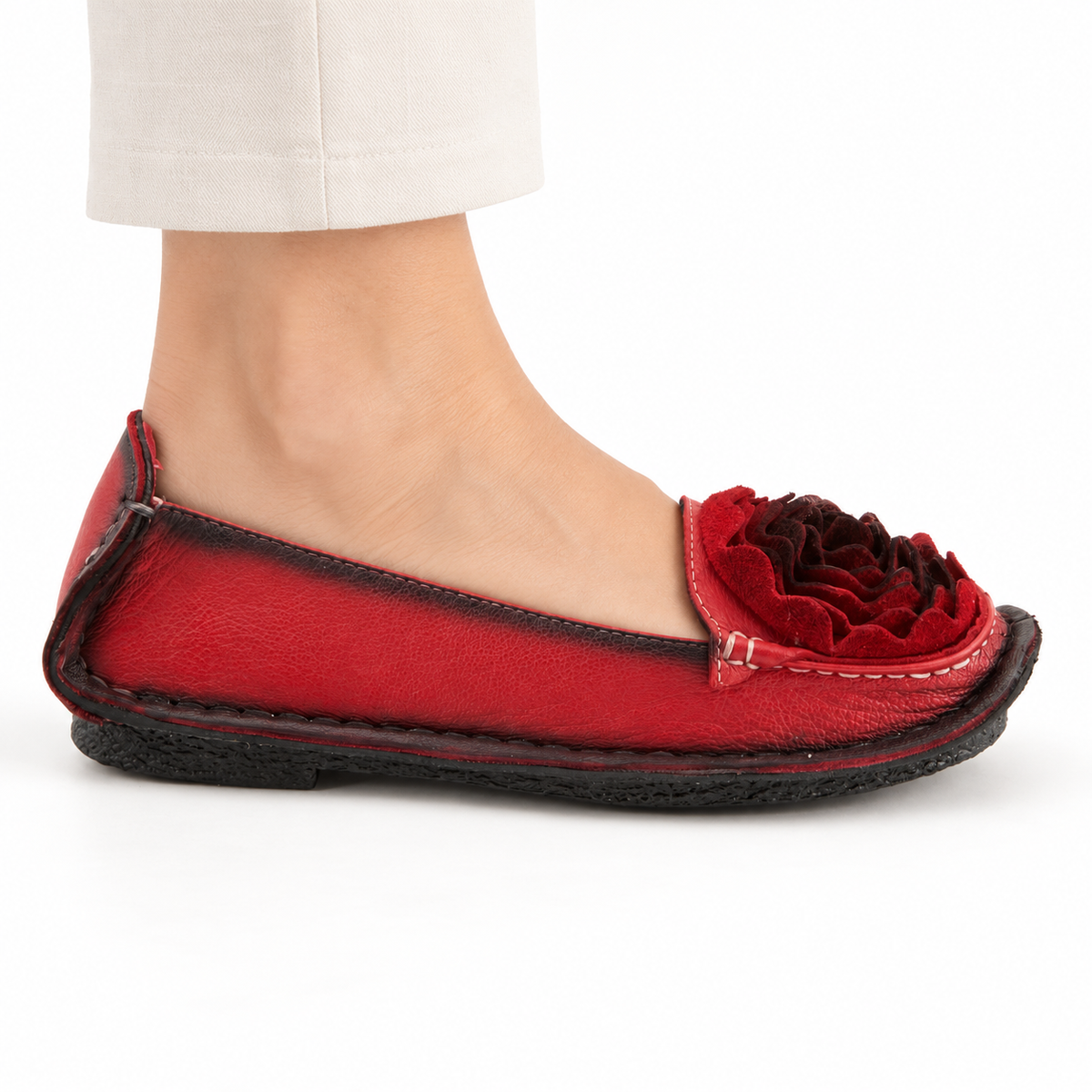 L'Artiste Dezi Red flat, on-foot side view against white; AI-generated styling illustration