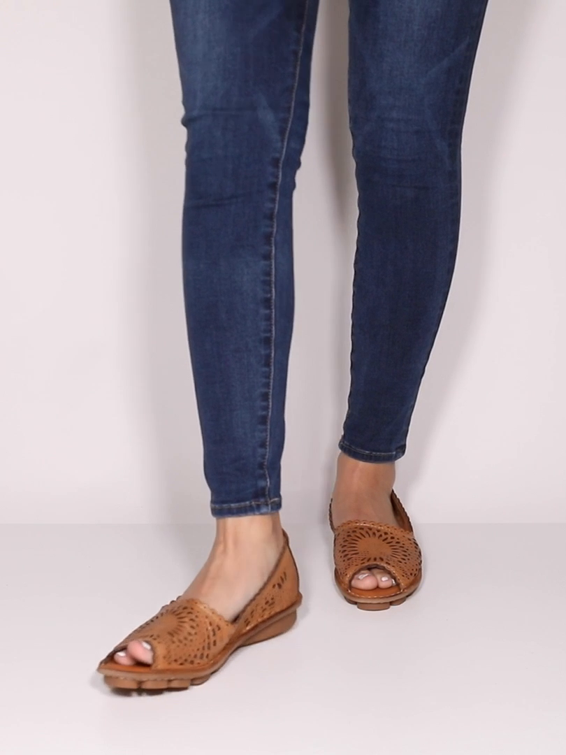 Spring Step Brandal Camel flats worn with jeans; still from manufacturer product video, original pale studio background