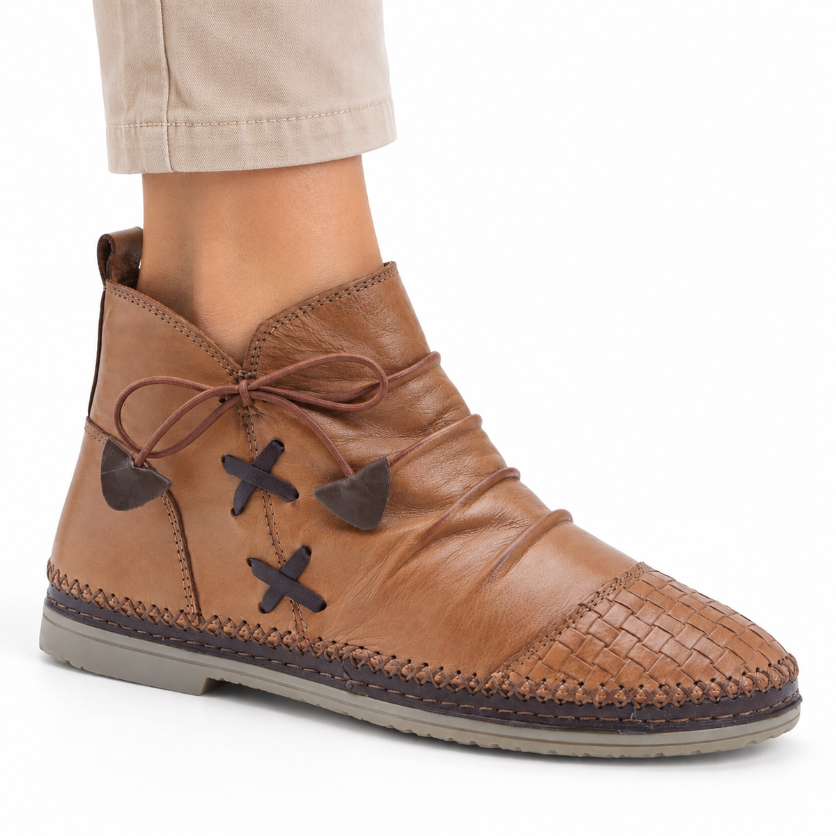 AI-generated on-model styling illustration of a camel Spring Step Pomeroy boot on a white background.