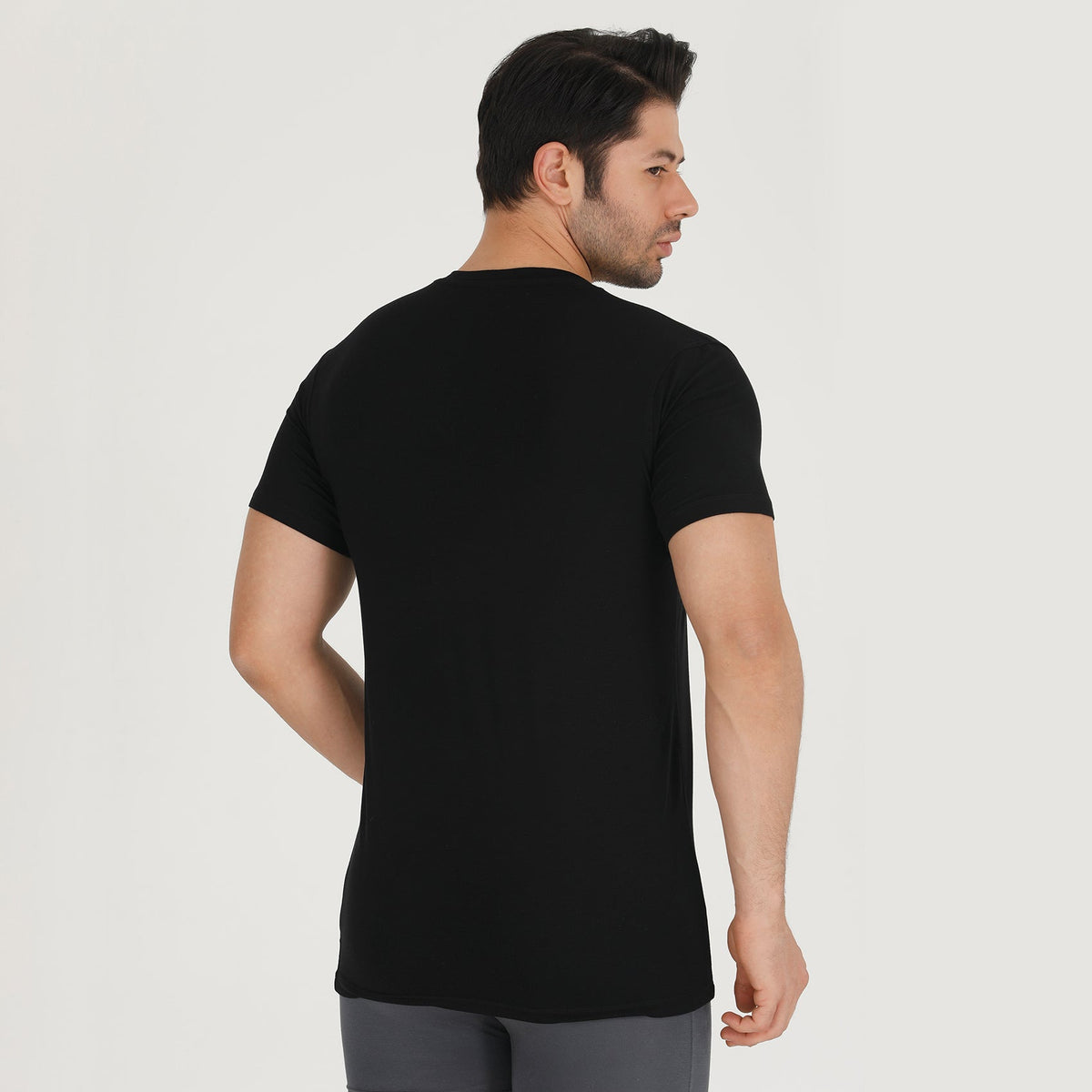 Bambooven V-neck undershirt in Black, on-model rear three-quarter view