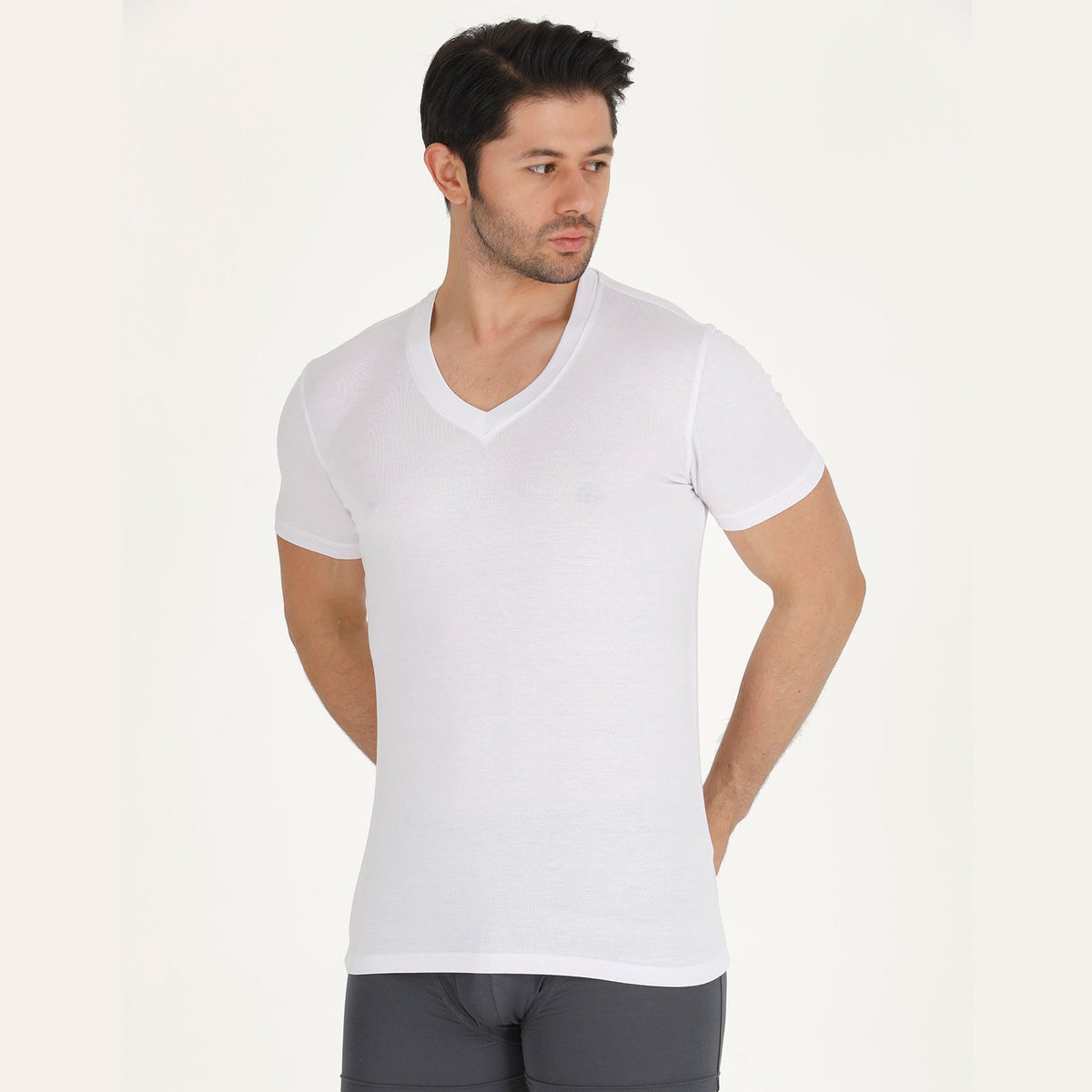 Bambooven V-neck undershirt in White, on-model front three-quarter view