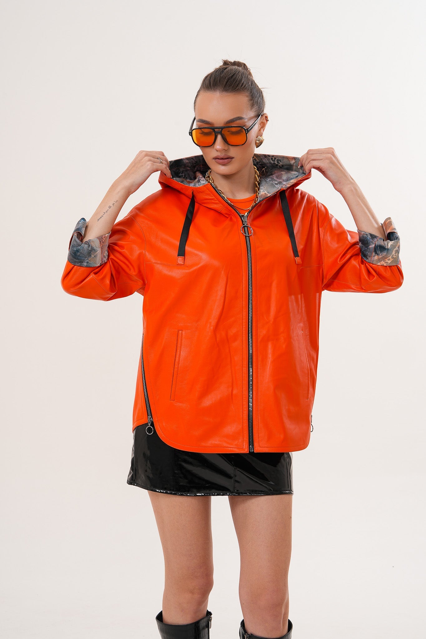 The Nyxara Reversible Hooded Orange Leather Women Jacket