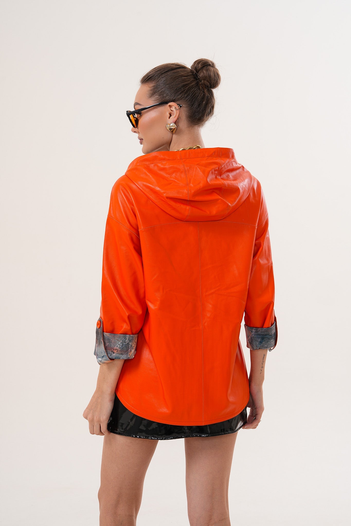 The Nyxara Reversible Hooded Orange Leather Women Jacket