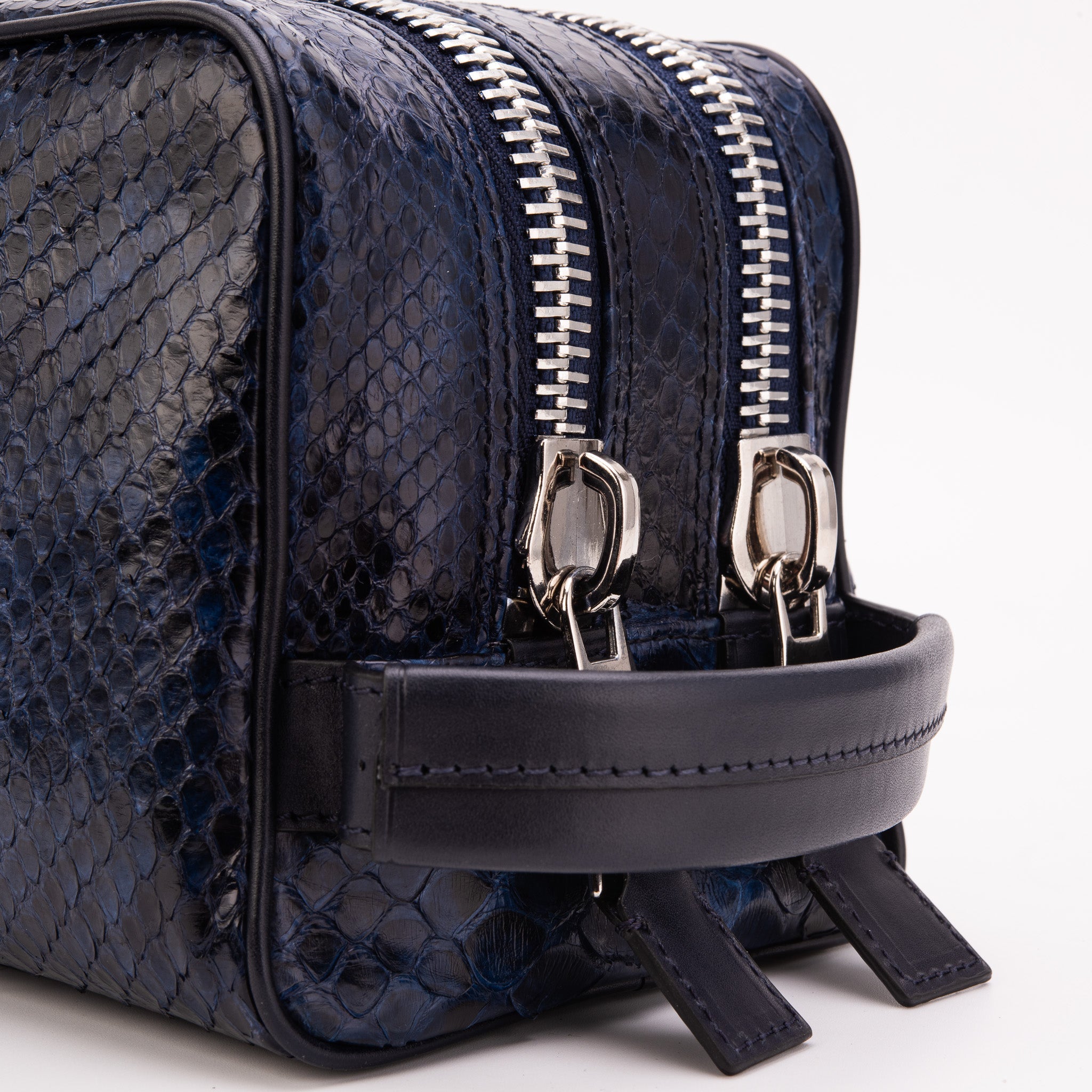 The Belluno Navy Blue Python Leather Men’s Essentials Bag