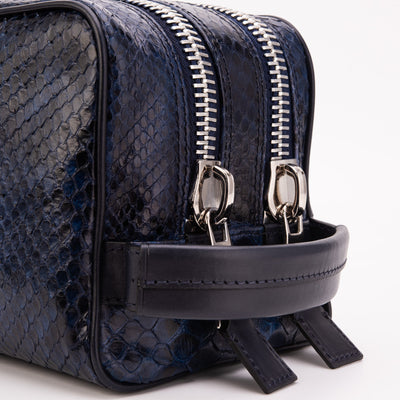 The Belluno Navy Blue Python Leather Men’s Essentials Bag