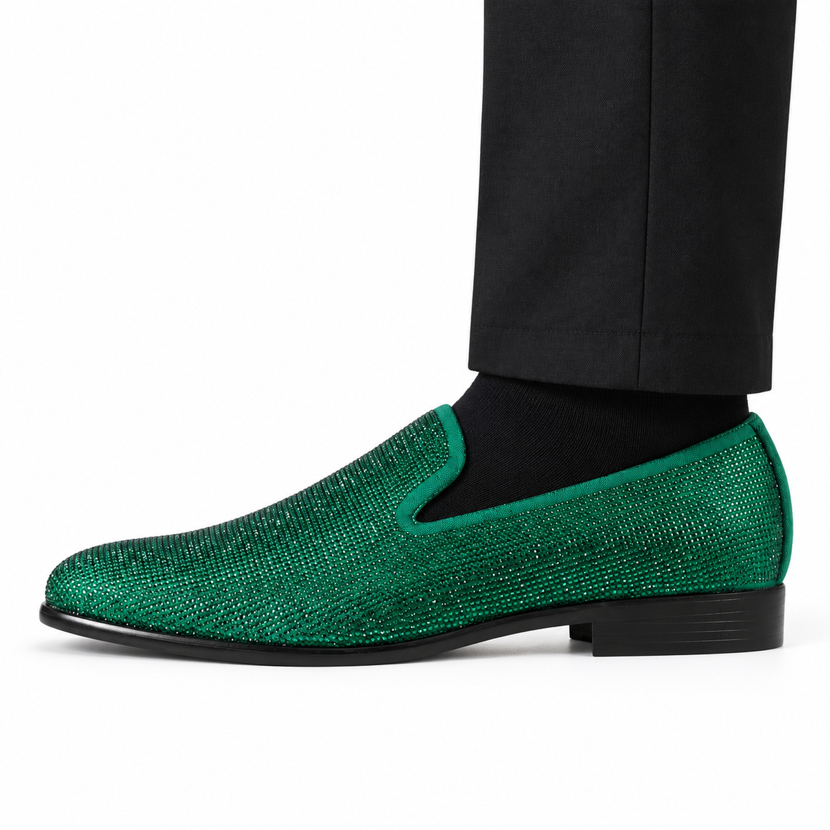 Amali Dazzle Green smoking slipper, side view on foot against white; AI-generated styling illustration