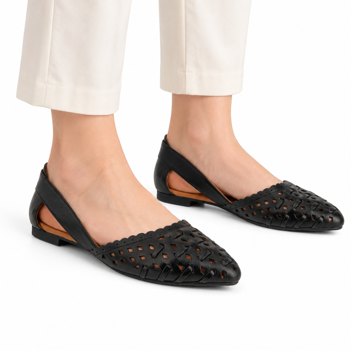 AI-generated styling illustration of an adult model wearing the Spring Step Delorse flats in Black; original product photo shows actual item details.