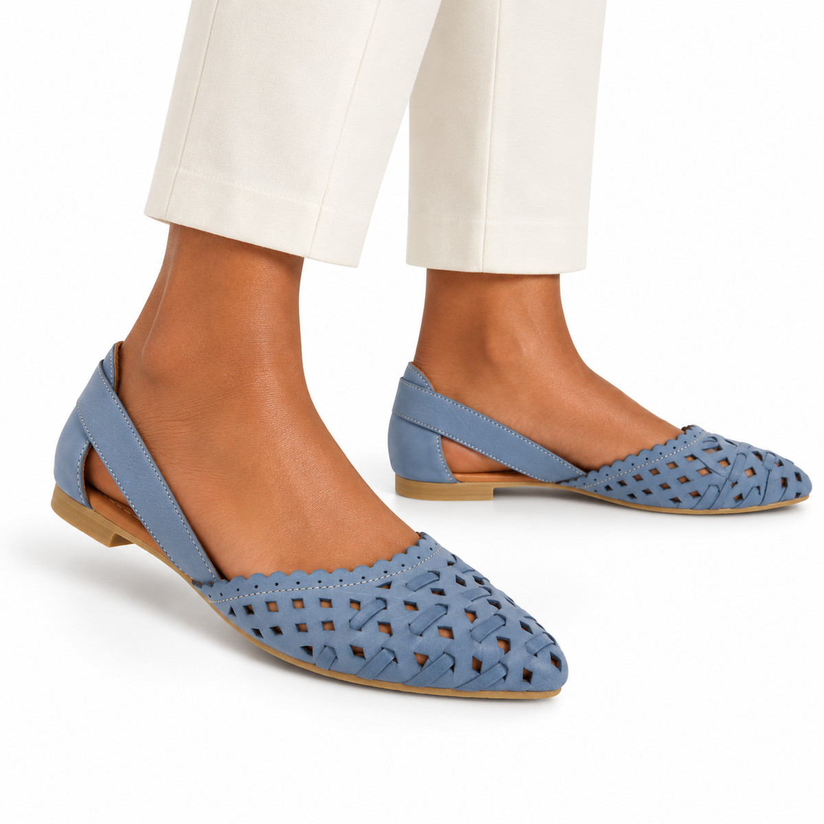 AI-generated styling illustration of an adult model wearing the Spring Step Delorse flats in Denim; original product photo shows actual item details.