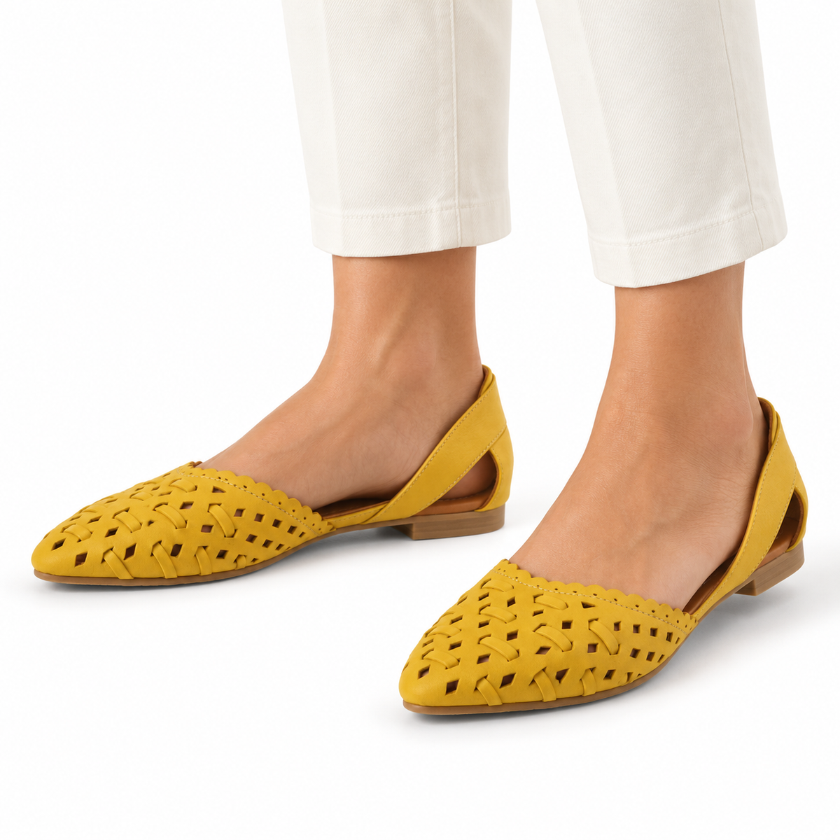 AI-generated styling illustration of an adult model wearing the Spring Step Delorse flats in Yellow; original product photo shows actual item details.