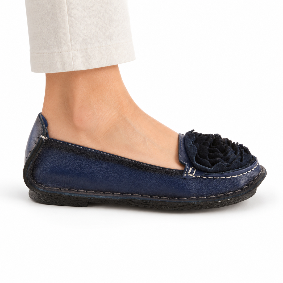 L'Artiste Dezi Navy flat, on-foot side view against white; AI-generated styling illustration
