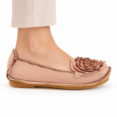 L'Artiste Dezi Pink flat, on-foot side view against white; AI-generated styling illustration