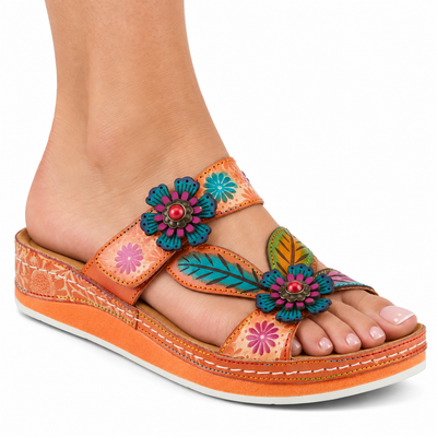 AI-generated on-model styling illustration of a L’Artiste Pillow-Soft sandal in Peach Multi on a white background.