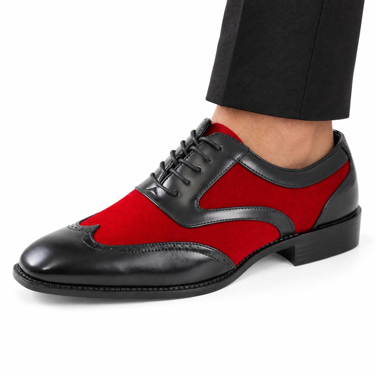 Sio Brighton red and black wingtip dress shoe on foot against a white background; AI-assisted styling image.