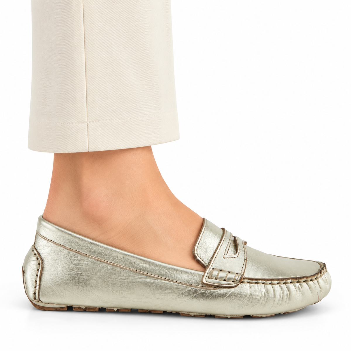 Spring Step Audette penny loafer in Silver, side view on foot against white; AI-generated styling illustration
