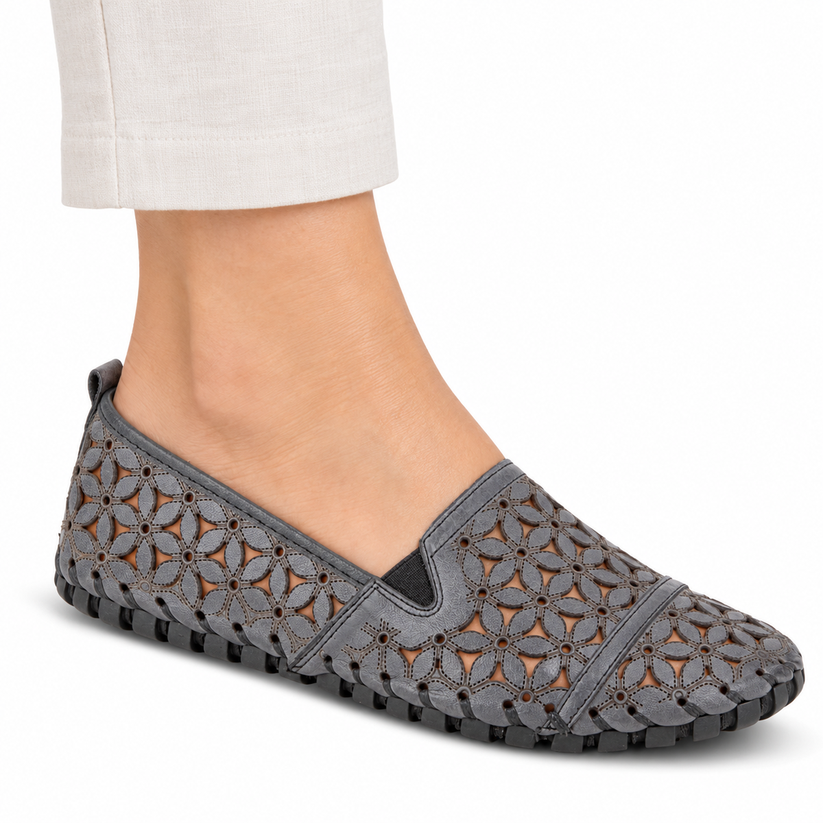 Spring Step Flowerflow Charcoal slip-on shoe, on-foot view against white; AI-generated styling illustration