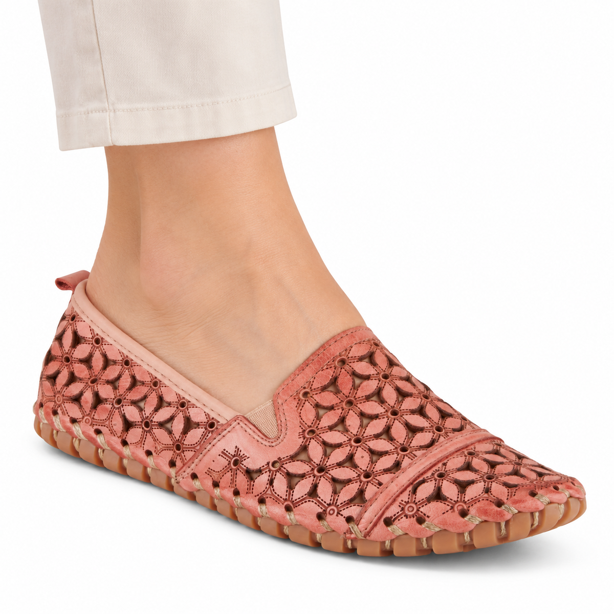 Spring Step Flowerflow Salmon slip-on shoe, on-foot view against white; AI-generated styling illustration